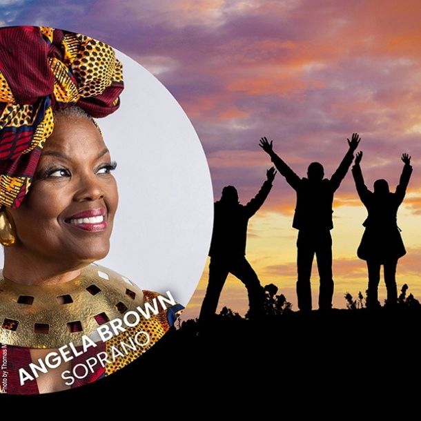 People, with arms raised in the air, standing on a hill silhouetted against a sunset with Soprano Angela Brown’s image overlaid in a circle on the left side of the photo with words for the Heroes concert
