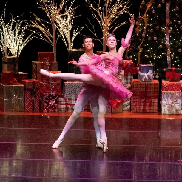 Dancers from the Indiana Ballet Conservatory performing The Nutcracker with ballerina in pink tutu